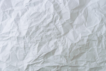 Top view of white crumpled paper texture background.
