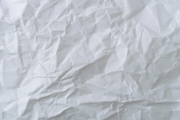 Top view of white crumpled paper texture background.