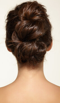 Female  with braided hair.