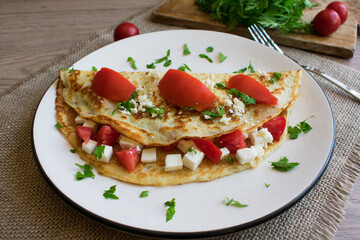 Cheese and Tomatoes in Homemade Delicious crepe
