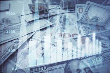 Multi exposure of forex chart drawing over us dollars bill background. Concept of financial success markets.