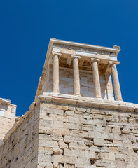 Fototapeta premium view of the Temple of Athena. acropolis of Athens on a sunny day. famous tourist location in the center of athens. Temple of Athena close up