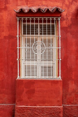 OLD WINDOW WITH SHUTTERS
