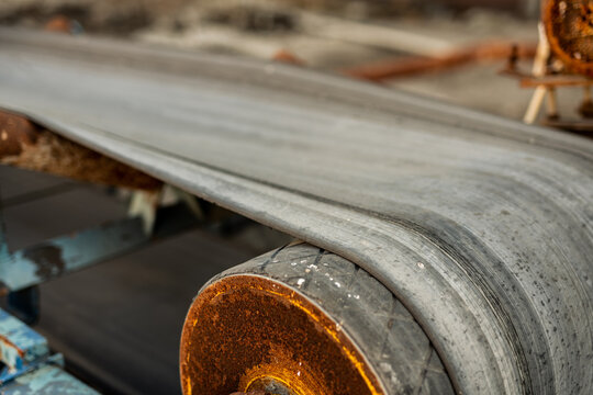 conveyor belt - rubber - wear and tear - old industrial machine