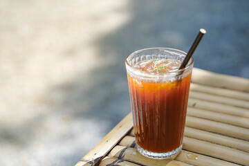 selective focus Long black coffee mixed with Lychee on nature background. iced drink menu of summer drink for relaxing day.