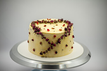 Delicious white vanilla cake with heart decor for Valentine's Day or wedding