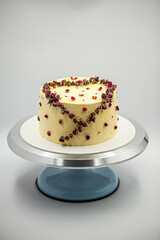 Delicious white vanilla cake with heart decor for Valentine's Day or wedding