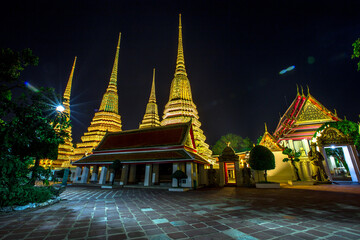 background of important religious attractions in Bangkok (Wat Phra Chetuphon (Wat Pho - reclining Buddha), a large pagoda and beautiful sculptural art give future generations to explore its history