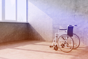 Fototapeta na wymiar wheelchair in an empty room with window