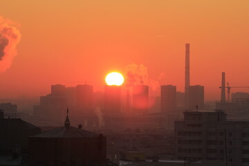 Fototapeta na wymiar Sunrise over the megapolis