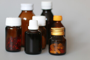 dark-colored medical bottles for storing tablets, capsules, powders, syrup