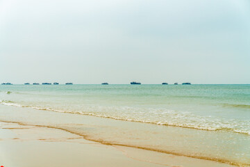Sea and sand under a blue sky