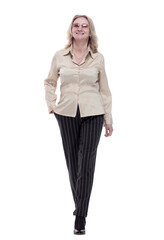 smiling casual woman striding forward. isolated on a white