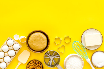 Baking homemade cake or cookie - dough in bowl with ingredients, top view