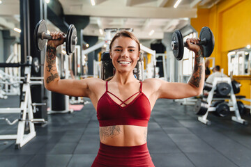 Fototapeta premium Woman fitness coach making sport exercise