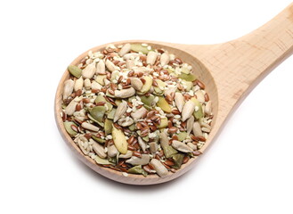 Seeds mix pile in wooden spoon with sunflower, sesame, linseed and pumpkin seed isolated on white background