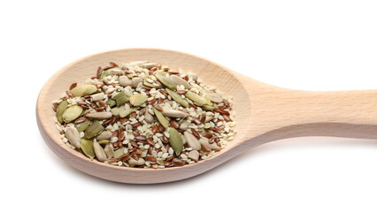 Seeds mix pile in wooden spoon with sunflower, sesame, linseed and pumpkin seed isolated on white background