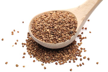 Buckwheat seed pile with wooden spoon isolated on white background