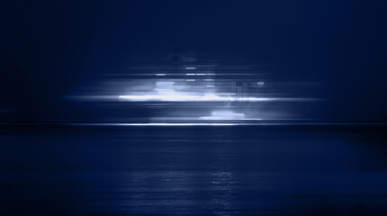 Long exposure photo of Large Cargo ship at the sea at night