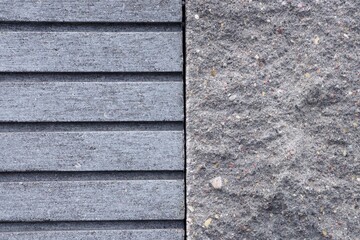 Half texture - tile on the right, stone on the left. The texture of paving slabs and stone. Building facade for design and text