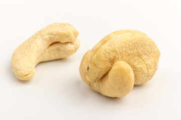 Raw cashew nuts isolated on white background.