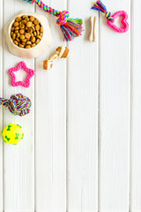 Toys for dogs with dry food and accessories, top view