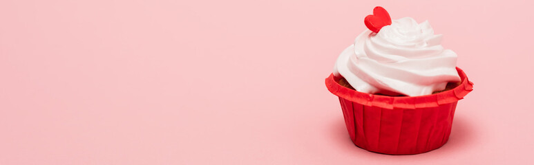 valentines cupcake with red heart on pink background, banner