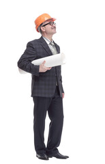 smiling architect with a roll of drawings. isolated on a white