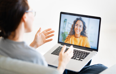 Fototapeta na wymiar woman is using laptop for remote conversation