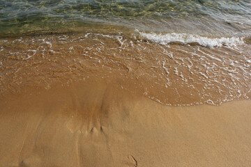 Sand beach and wave