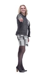 smiling young woman pointing at you. isolated on a white