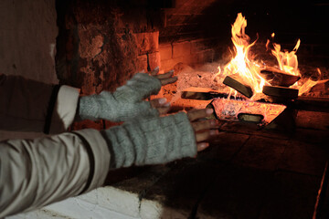 Russian stove with wood burning in it. Defocus .