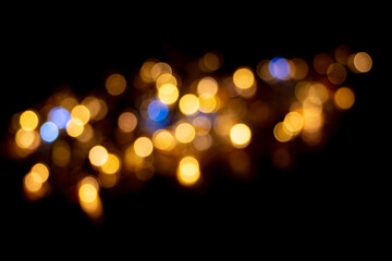 Perfect yellow and blue bokeh for a festive background. De-focused Abstract Light Circles