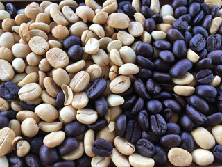 Roasted and dried coffee beans background.