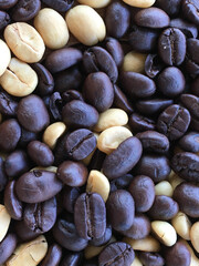 Roasted and dried coffee beans background.