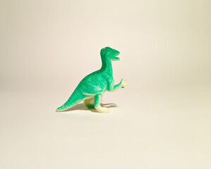toy dinosaur a white background	