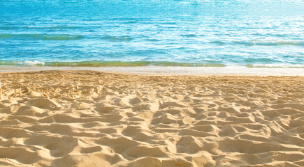 Fototapeta na wymiar Empty sandy beach and sea background with copy space