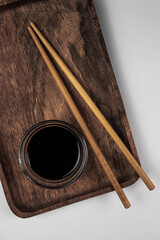 Japanese sushi chopsticks and sauce bowl. tasty soy sauce. Chopsticks.