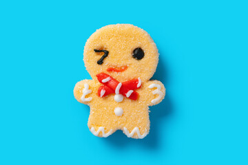 cute gingerbread shape candy on a blue background