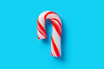 Christmas stick candy on a blue background