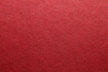 Fabric background in cardinal red. Abstract background with seamless pattern.