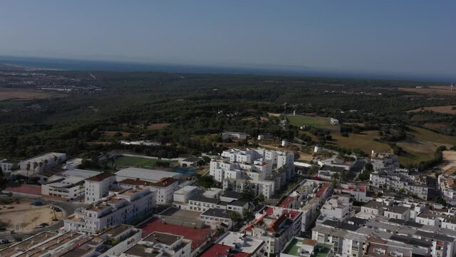 Streets and houses of Vejer de la Frontera seen from above. Aerial perspective of Andalusian town.