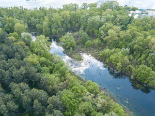Aerial drone view. Pond in the city.