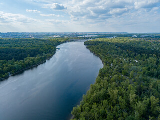 Aerial drone view. Dnieper river in Kiev on a sunny day.