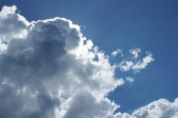 bright cumulus cloud and blue sky