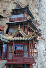 Obraz premium The Hanging Temple or Hanging Monastery near Datong in Shanxi Province, China. Detail of the wooden architecture within the temple. The Hanging Temple is a major tourist sight near Datong.