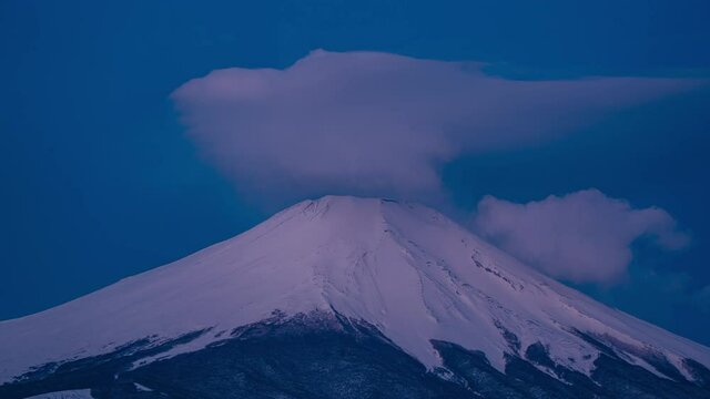 Mt Fuji summit sunrise night to day with clouds