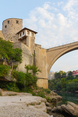 Fototapeta na wymiar View of the tower of the Old Bridge in the Old Town of Mostar at dawn. Bosnia and Herzegovina