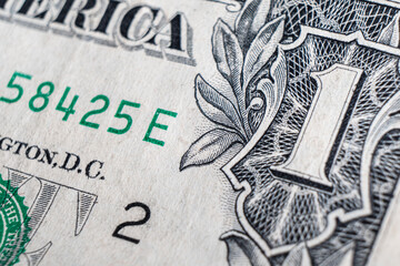Dollar bill close up photo. Detail of US one dollar banknote with. Macro shot of single dollar bill. Top view of USA currency note with inscriptions