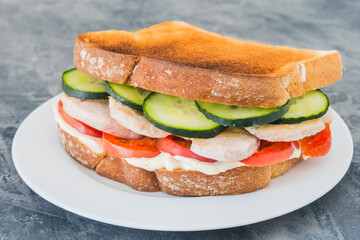 Sandwich chicken with tomato and cucumber